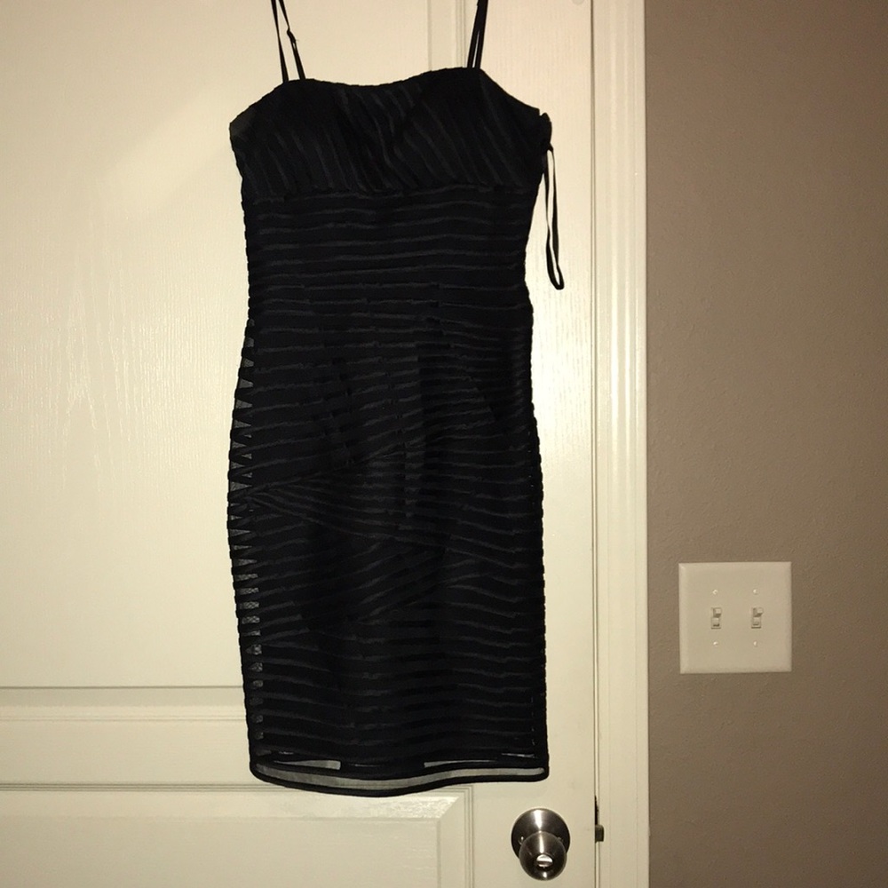 Tight black mini dress